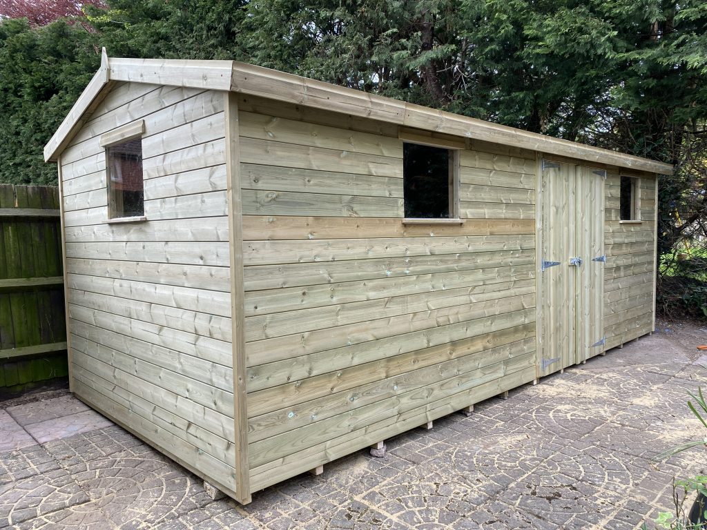 8x18 garden shed with double doors and three windows, apex roof